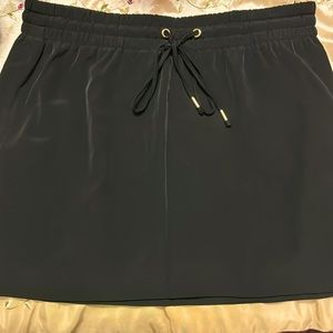 Express miniskirt black & gold accents